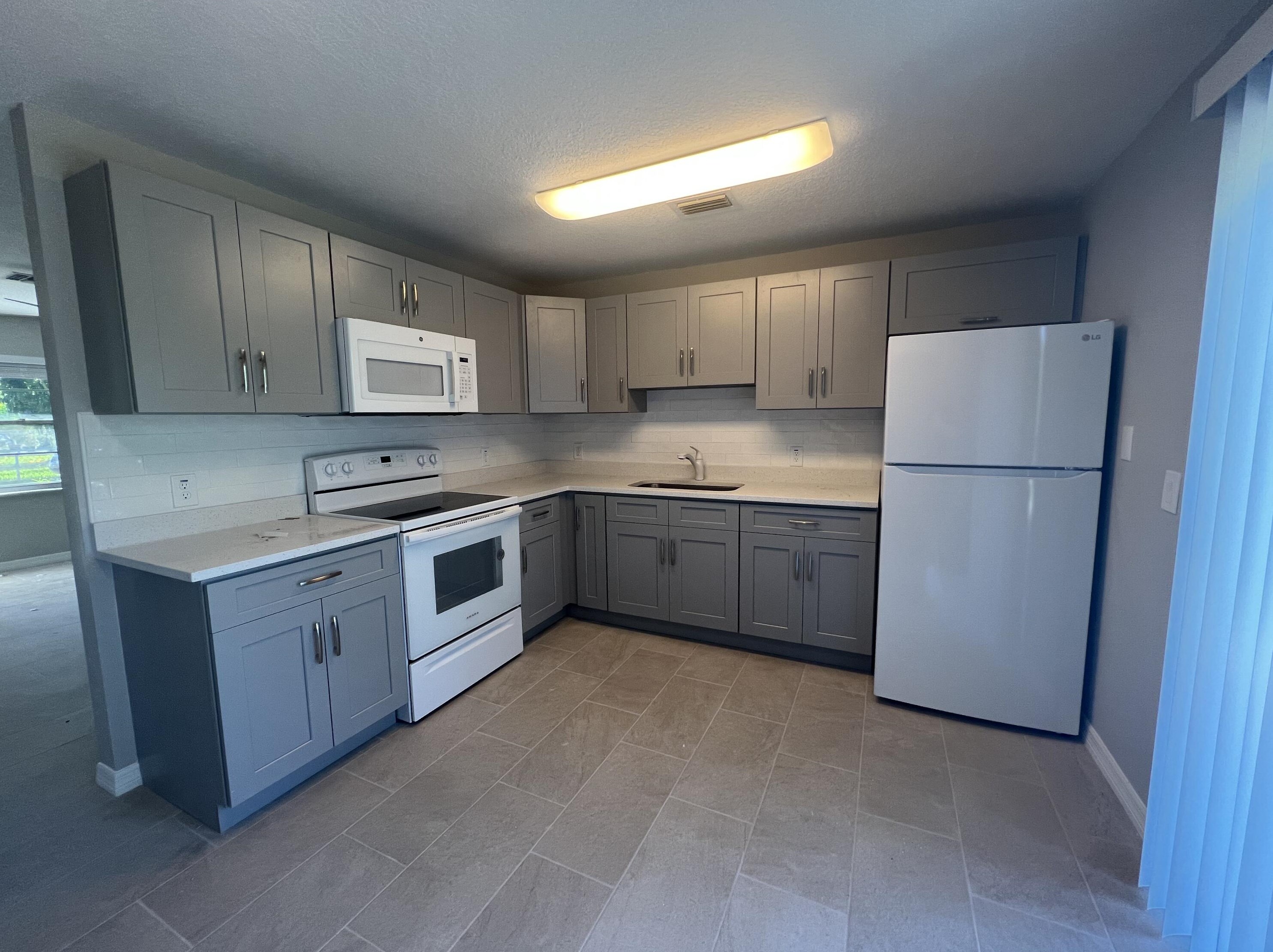1887 Breezy Ln, West Palm Beach, FL 33417