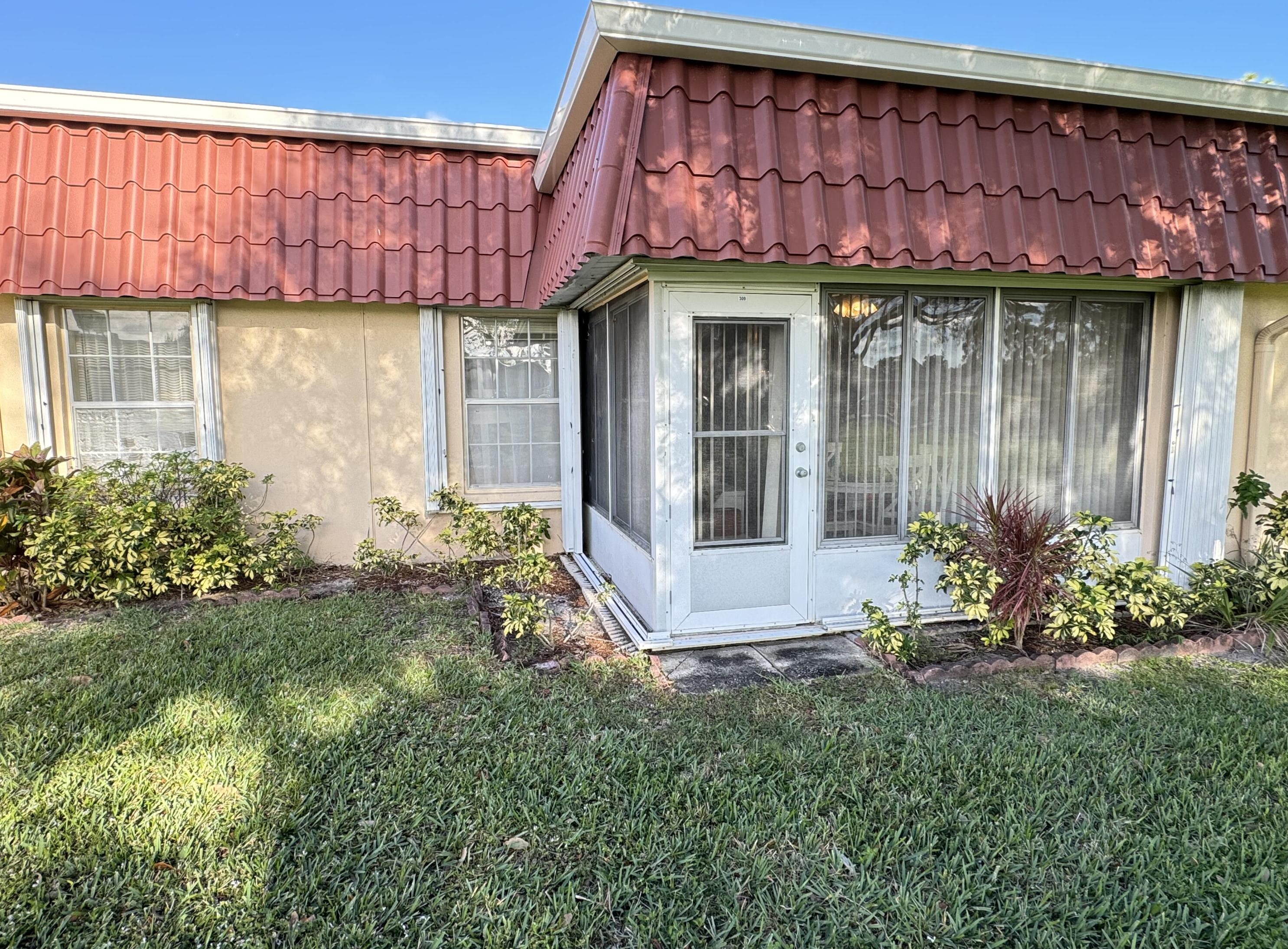 309 Cape Cod Cir, Lake Worth FL  33467-2675 exterior