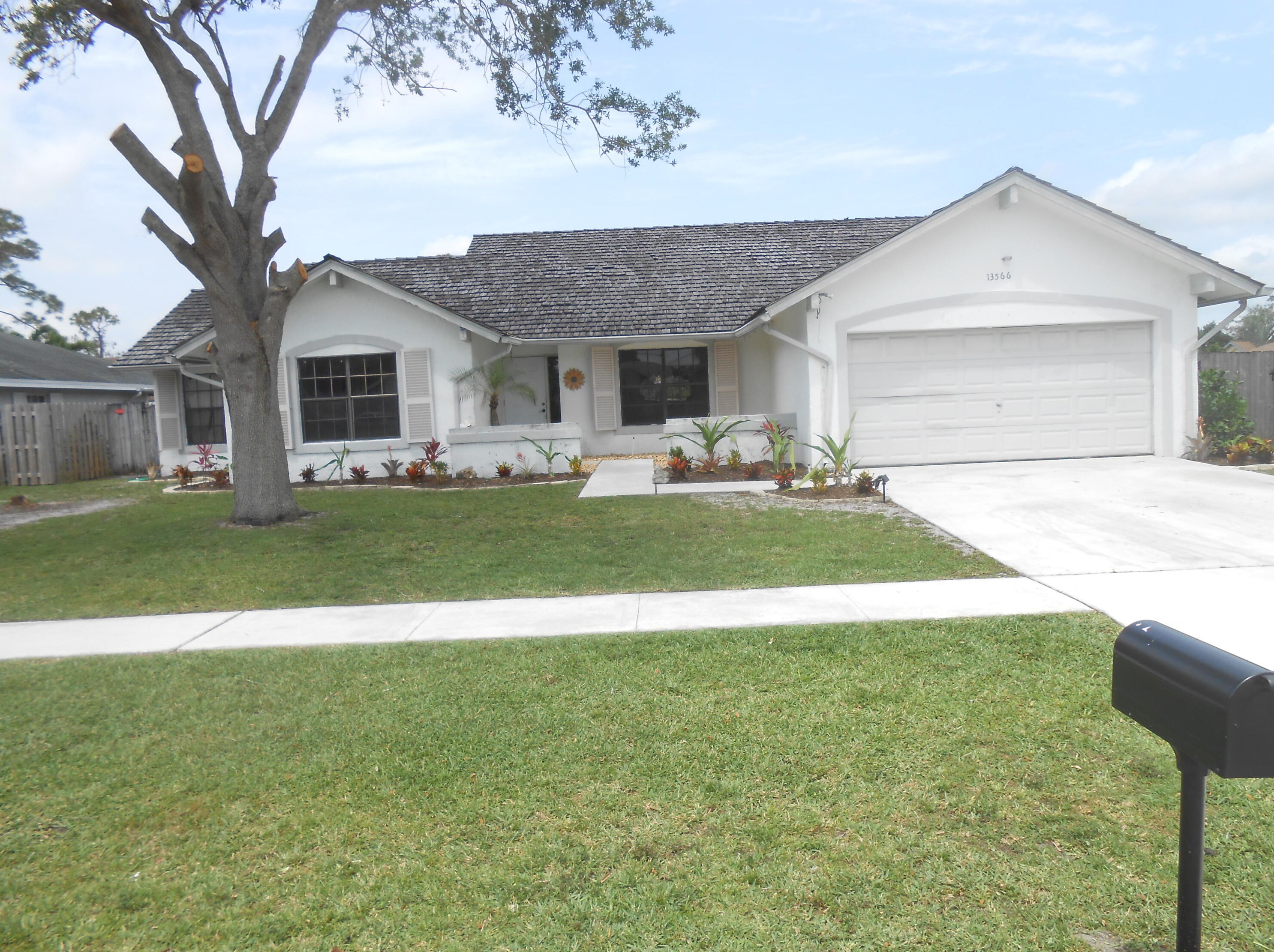 13566 Exotica Ln, West Palm Beach, FL 33414-8103