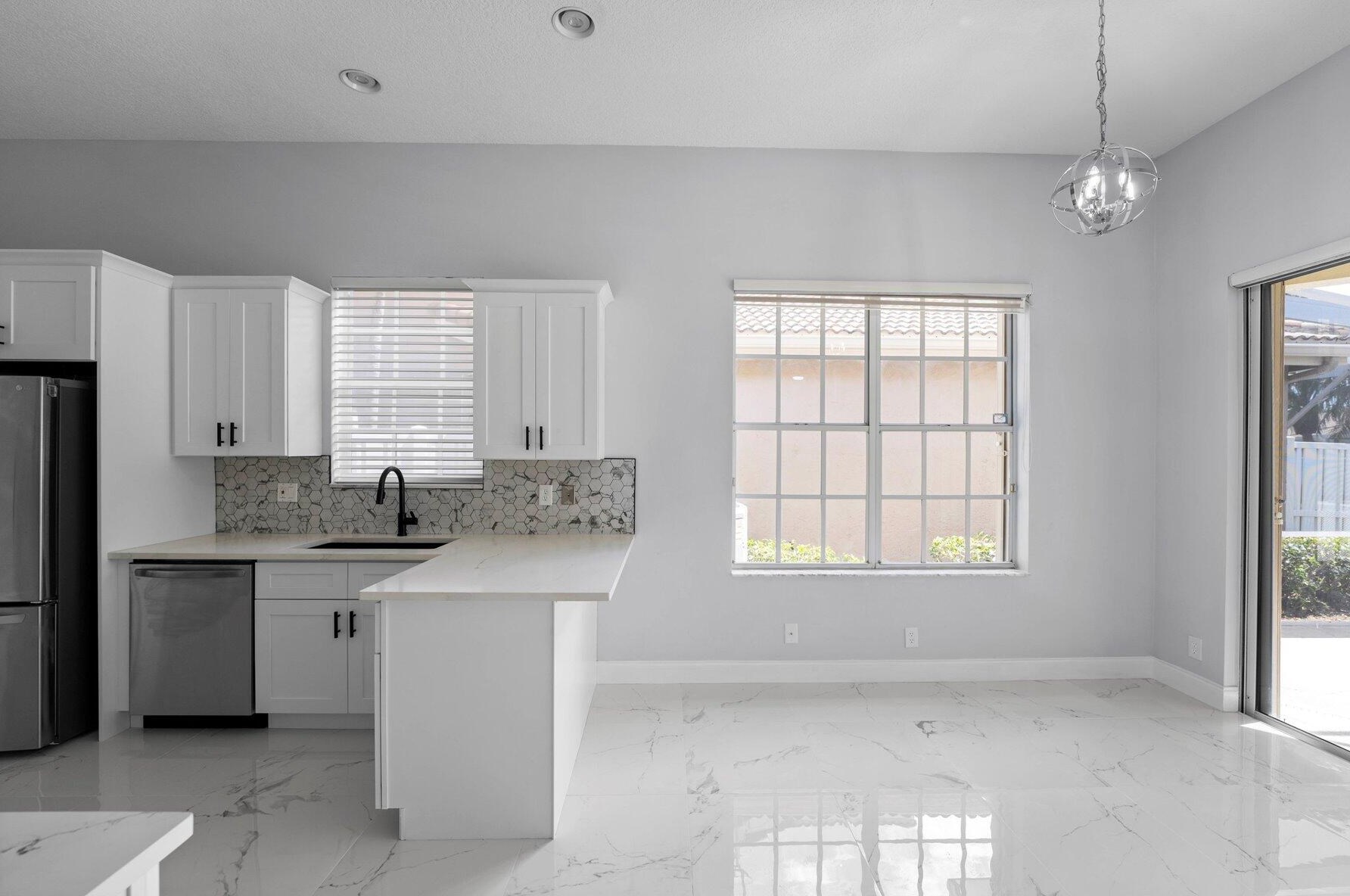 8226 Quail Mdw Way, West Palm Beach FL  33412-1516 exterior