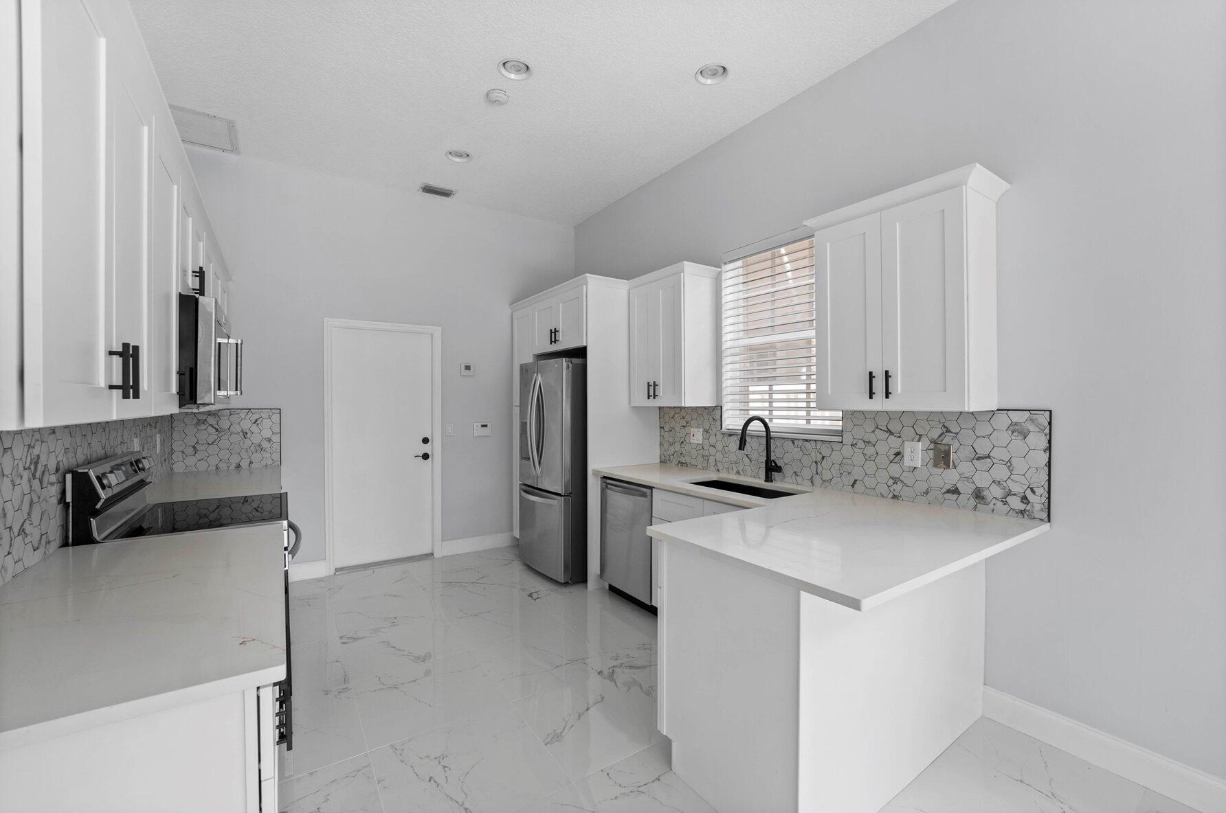 8226 Quail Mdw Way, West Palm Beach FL  33412-1516 exterior