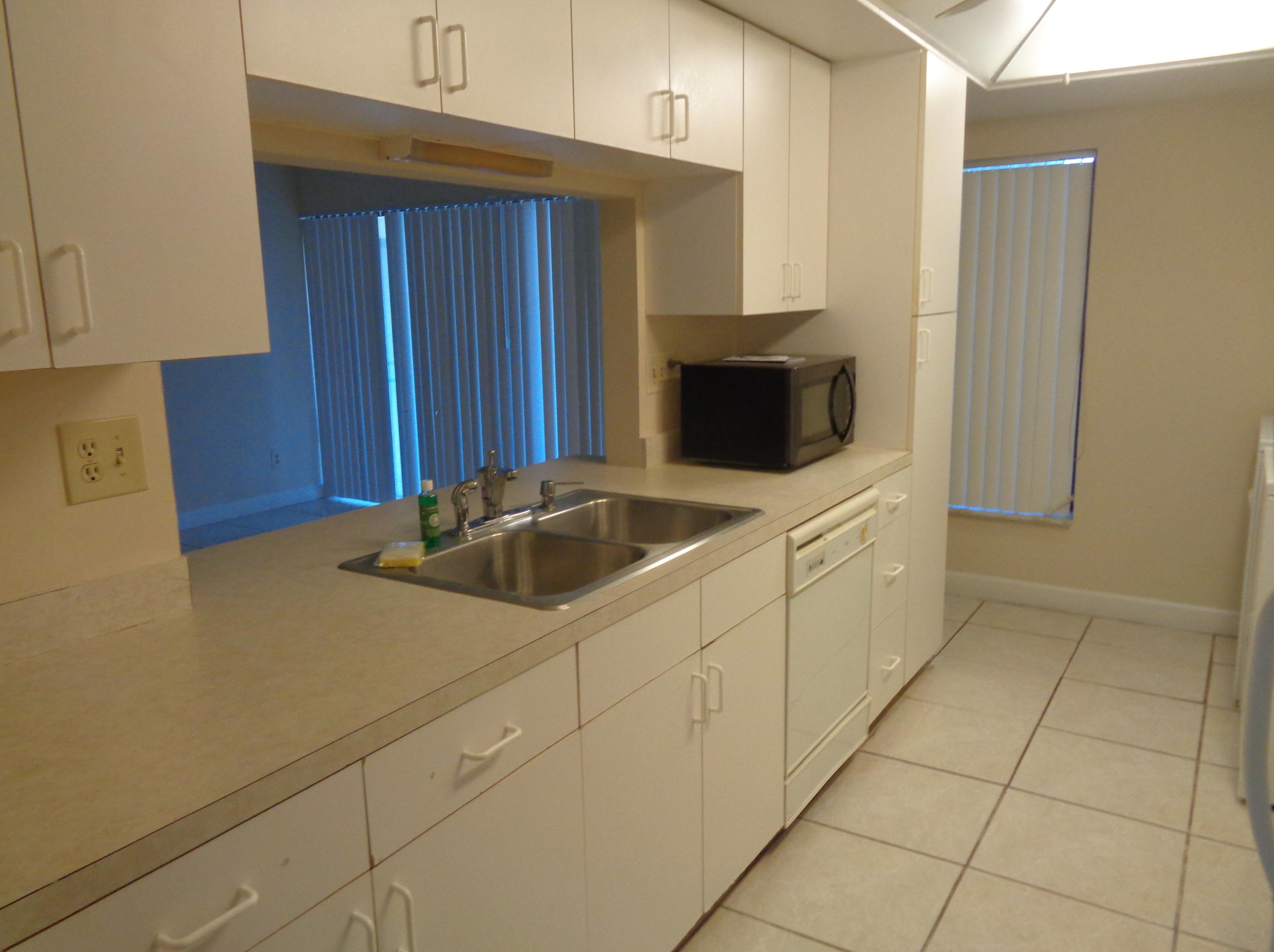 1455 White Pine Dr, West Palm Beach, FL 33414-5783
