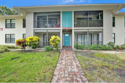 9845 Pineapple Tree Drive, Unit #102, Boynton Beach, FL 33436 - Photo 1