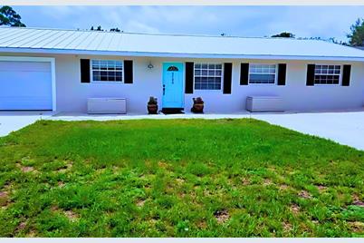 8744 SE Jardin Street, Hobe Sound, FL 33455 - Photo 1