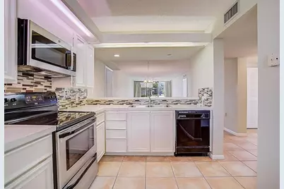 2441 Village Boulevard #102, West Palm Beach, FL 33409 - Photo 2