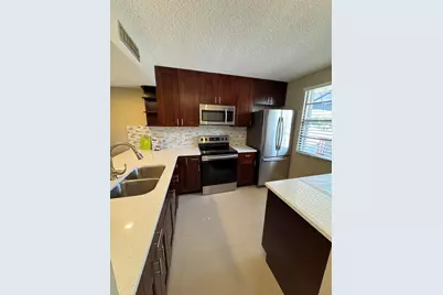 3521 Village Boulevard, Unit #103, West Palm Beach, FL 33409 - Photo 1