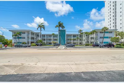 419 Golden Isles Drive, Unit #107, Hallandale Beach, FL 33009 - Photo 1