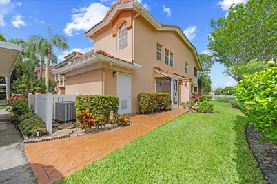 7825 Whispering Palms Drive, Unit #202, Boynton Beach, FL 33437 - Photo 1