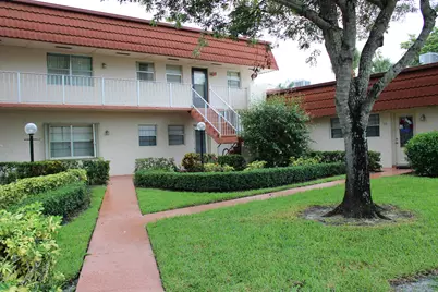 12008 Poinciana Boulevard #206, Royal Palm Beach, FL 33411 - Photo 1