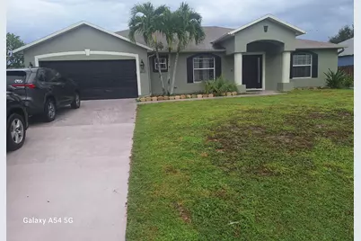 4641 SW Alpha Street, Port Saint Lucie, FL 34953 - Photo 1