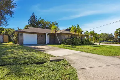 1102 SE Petunia Avenue, Port Saint Lucie, FL 34952 - Photo 1