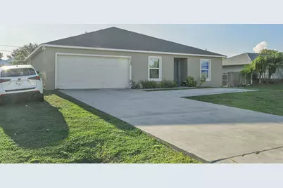 1122 SW Del Rio Boulevard, Port Saint Lucie, FL 34953 - Photo 1