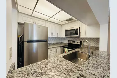 7106 Golf Colony Court, Unit #104, Lake Worth, FL 33467 - Photo 10