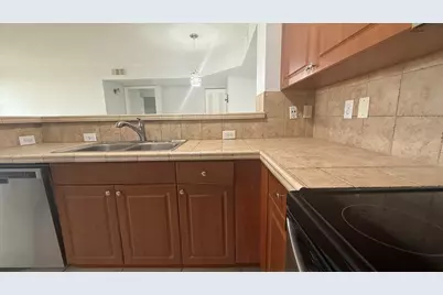 1755 Village Boulevard, Unit #105, West Palm Beach, FL 33409 - Photo 4