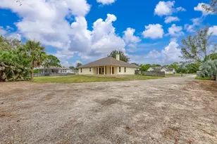 16931 W Aquaduct Dr, The Acreage, FL 33470 - Photo 36