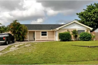 383 SW Tulip Boulevard, Port Saint Lucie, FL 34953 - Photo 1