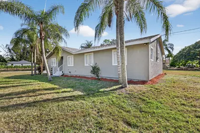 17296 W Sycamore Drive, The Acreage, FL 33470 - Photo 2