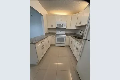 5930 Whispering Pine Way, Unit #B-1, Greenacres, FL 33463 - Photo 14