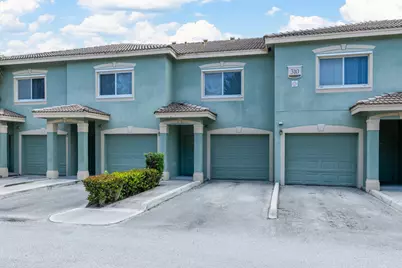 310 Crestwood Circle, Unit #102, Royal Palm Beach, FL 33411 - Photo 1
