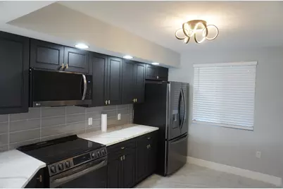 2811 Village Boulevard, Unit #201, West Palm Beach, FL 33409 - Photo 1