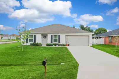 591 SW Halifax Avenue, Port Saint Lucie, FL 34953 - Photo 1