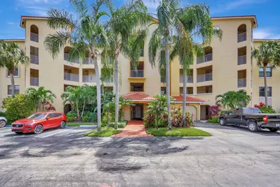 100 Uno Lago Drive, Unit #104, Juno Beach, FL 33408 - Photo 1