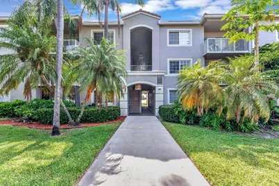 5055 Wiles Road #301, Coconut Creek, FL 33073 - Photo 1