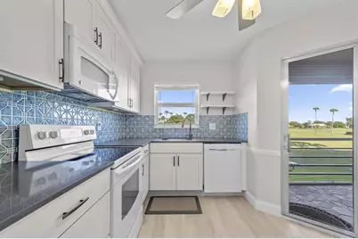 3871 Via Poinciana, Unit #201, Lake Worth, FL 33467 - Photo 1