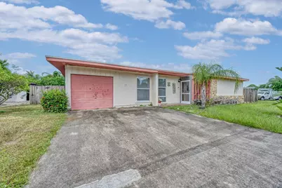 159 NE Lobster Road, Port Saint Lucie, FL 34983 - Photo 1