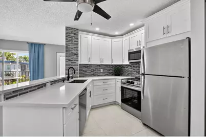 7535 S Oriole Boulevard, Unit #208, Delray Beach, FL 33446 - Photo 1