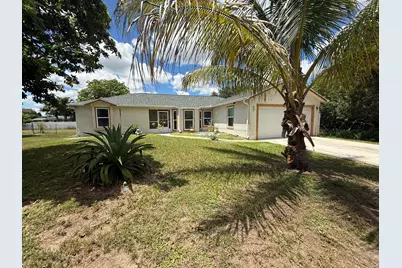 1888 SW Angelico Lane, Port Saint Lucie, FL 34953 - Photo 1