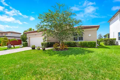 7408 NW Greenspring Street, Port Saint Lucie, FL 34987 - Photo 1