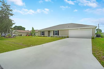 438 SW Meadow Terrace, Port Saint Lucie, FL 34953 - Photo 1