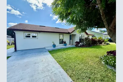 2409 SW Hinchman Street, Port Saint Lucie, FL 34984 - Photo 1