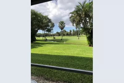 3980 Oaks Clubhouse Drive #101, Pompano Beach, FL 33069 - Photo 1