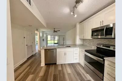 3939 NE 5th Avenue, Unit #B102, Boca Raton, FL 33431 - Photo 1