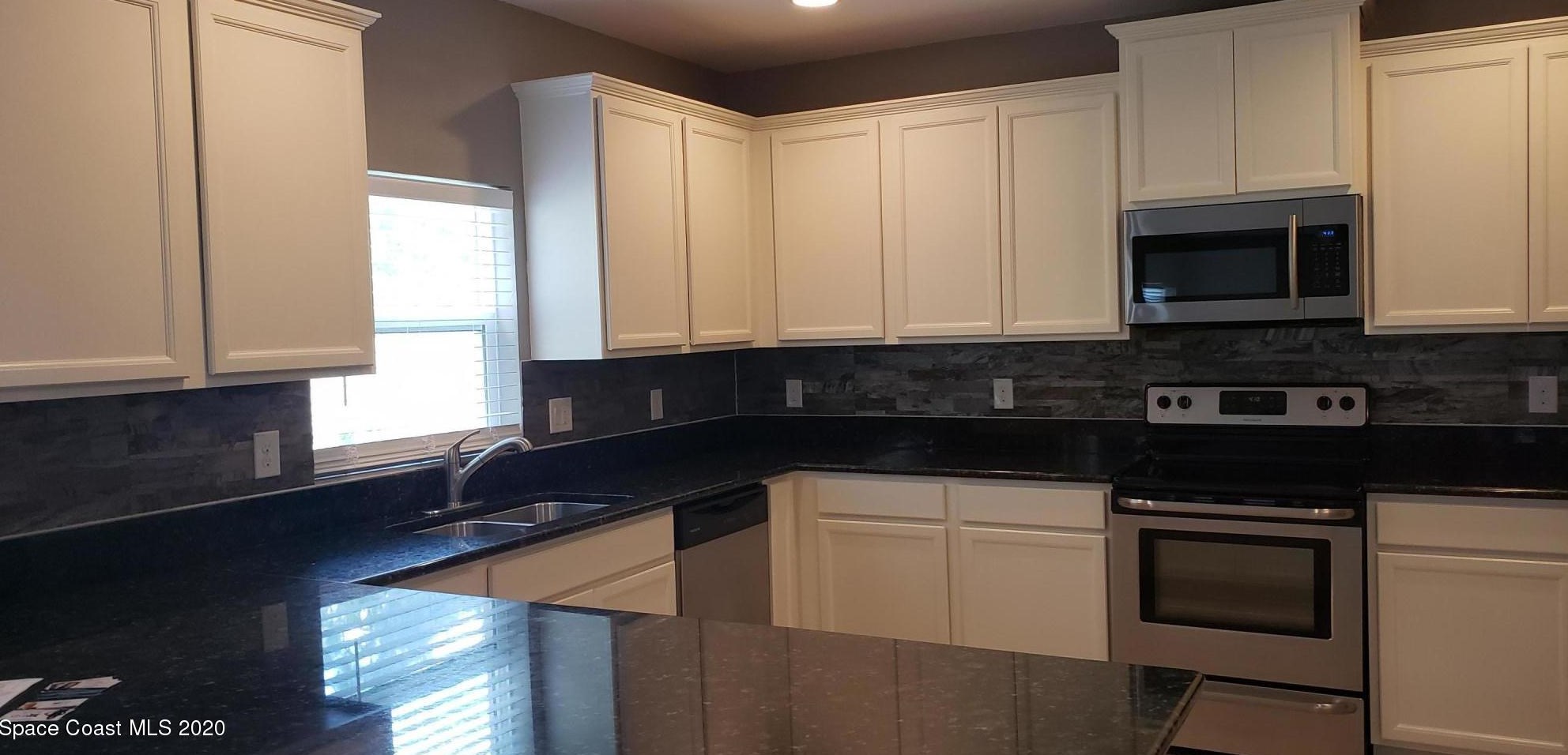 674 Easton Frst Cir, Melbourne FL 32909-6847 exterior