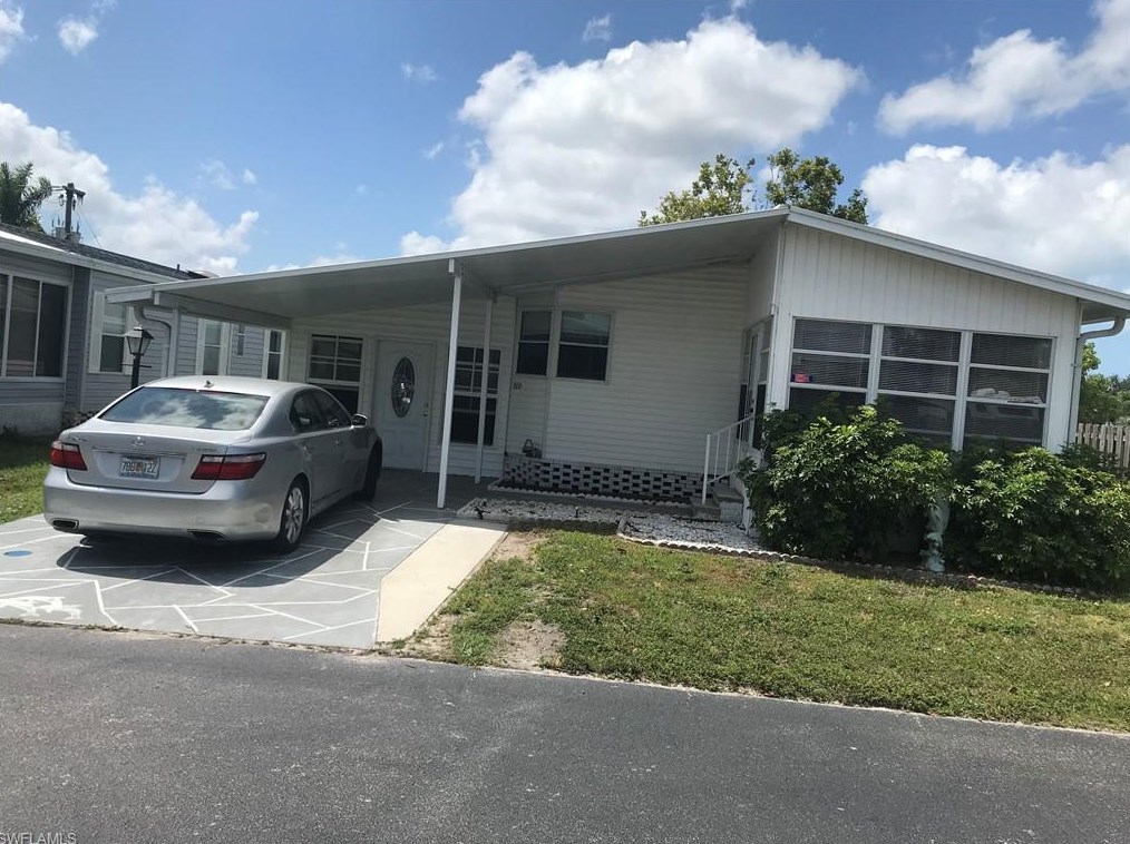 910 Plymouth Rock Dr, Naples, FL 34110