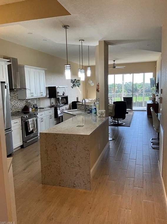 7687 Pebble Creek Cir #403, Naples, FL 34108