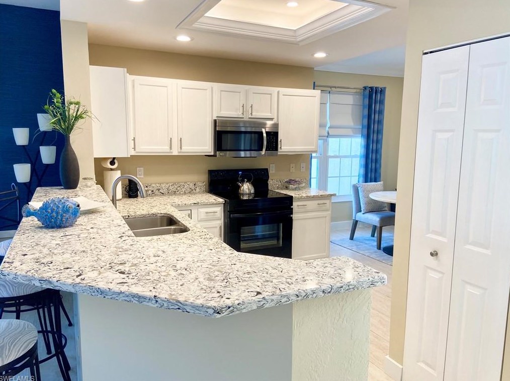 437 Wiggins Lake Ct #102, Naples, FL 34110