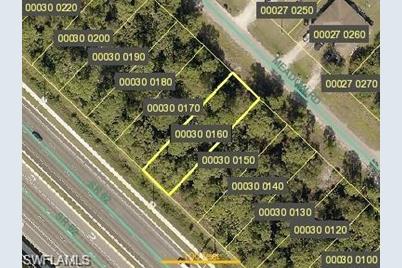 146 Meadow Rd, Lehigh Acres, FL 33973 - Photo 1