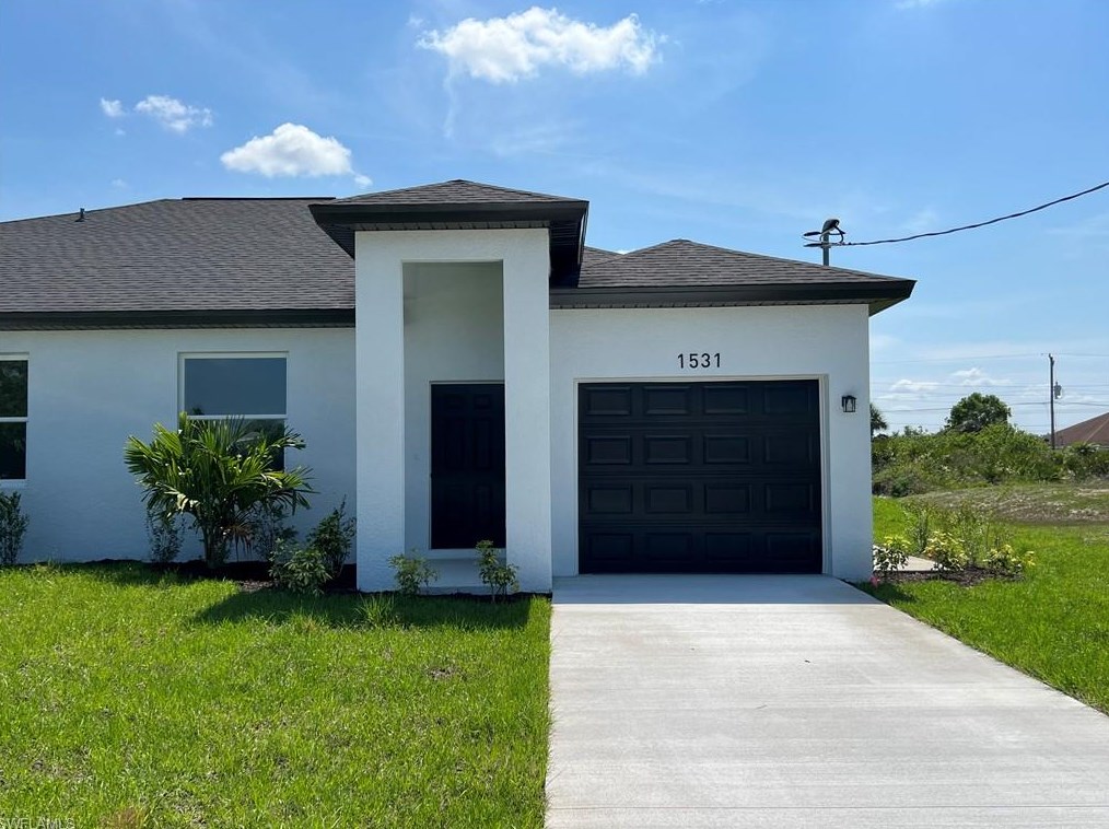 1529-1531 Gordon Ave S, Lehigh Acres, FL 33973