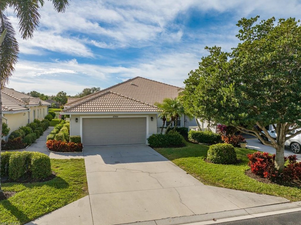 6948 Lone Oak Blvd, Naples, FL 34109