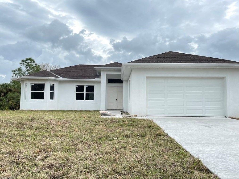 523 Harry Thayer Ave, Lehigh Acres, FL 33974-9663