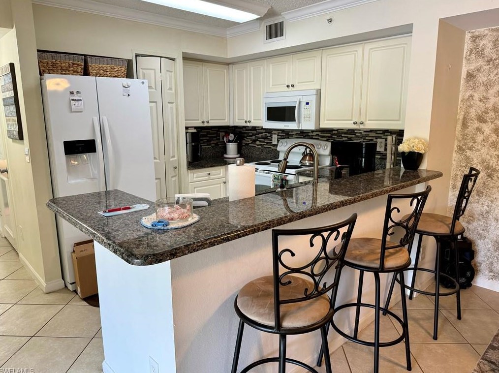 1210 Wildwood Lakes Blvd #203, Naples, FL 34104