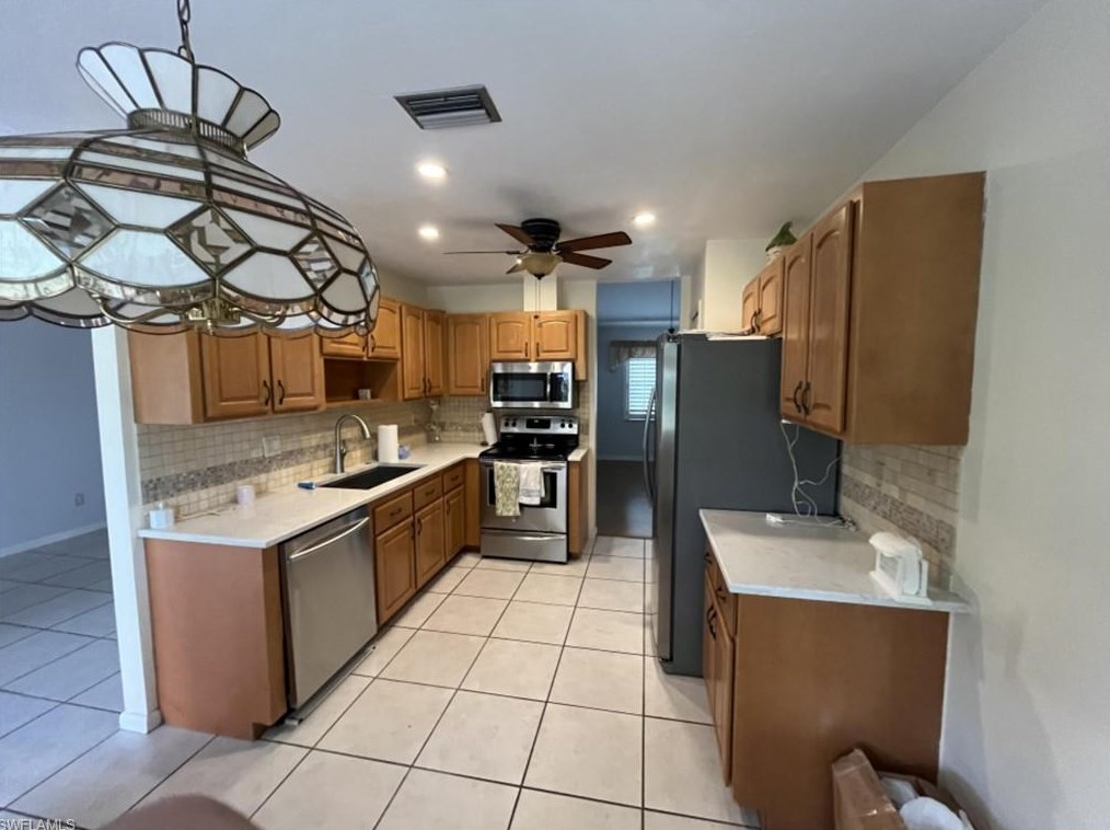 119 Madison Dr, Naples FL 34110-1323 exterior