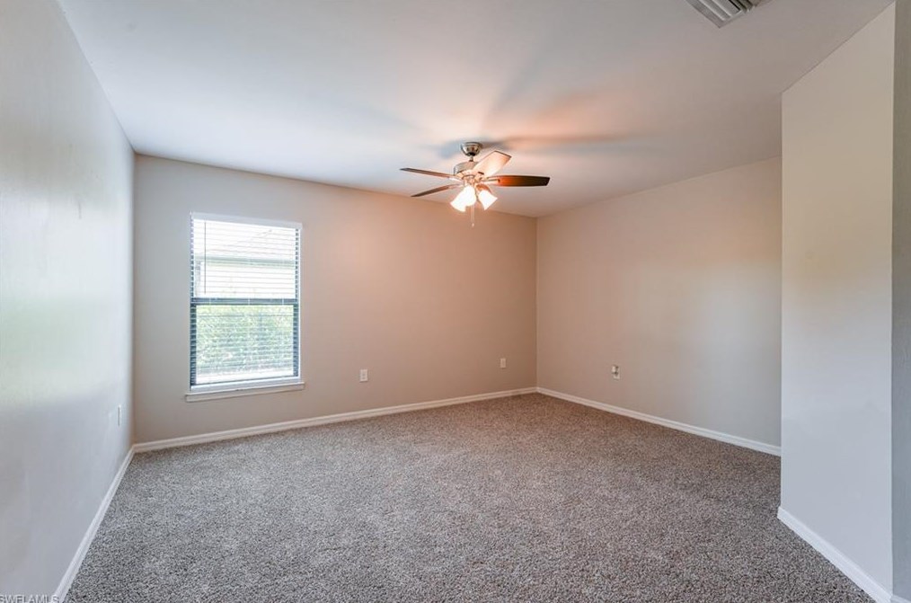 133 Shadow Lk Dr, Lehigh Acres FL 33974-0826 exterior