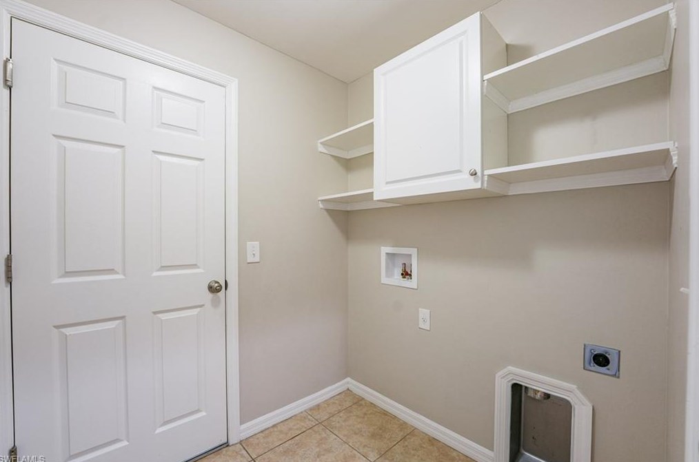 133 Shadow Lk Dr, Lehigh Acres FL 33974-0826 exterior