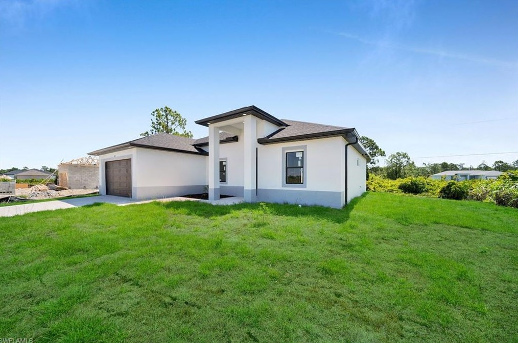 1220 Hibiscus Ave, Lehigh Acres, FL 33972-8403