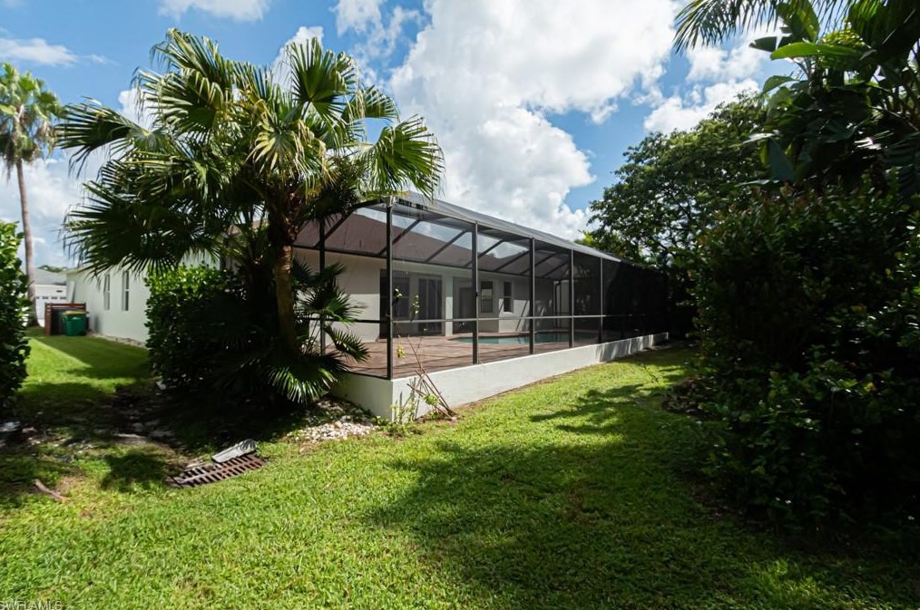 303 Burnt Pne Dr, Naples FL 34119-9773 exterior